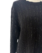Embellished Sweater on a mannequin on white background