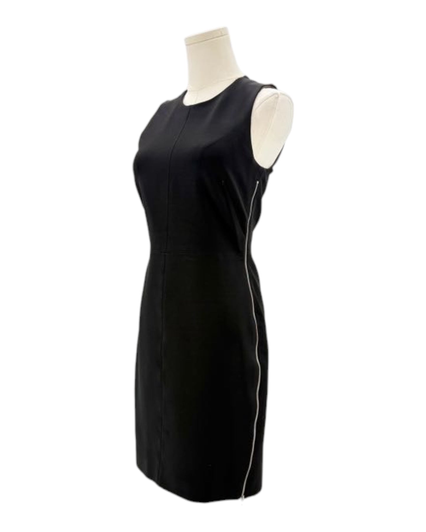 Black sleeveless dress on a mannequin against a white background