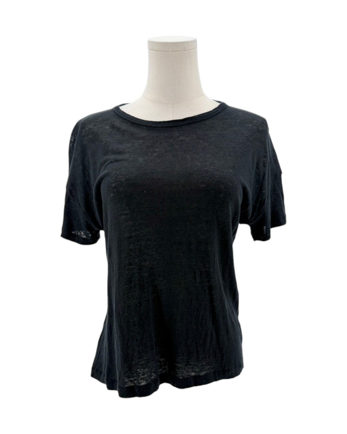 Black t-shirt on a mannequin against a white background