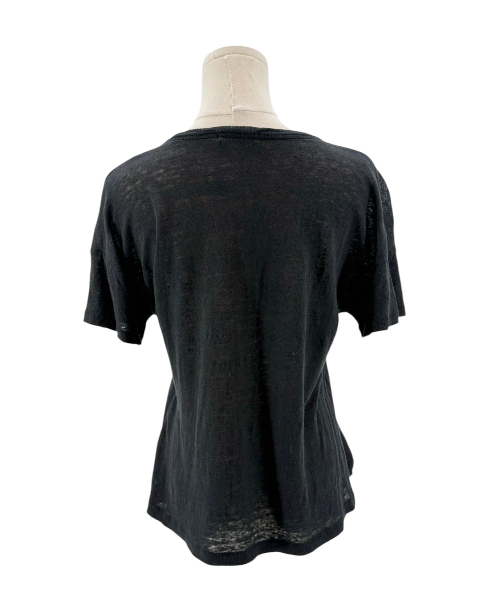 Black t-shirt on a mannequin against a white background