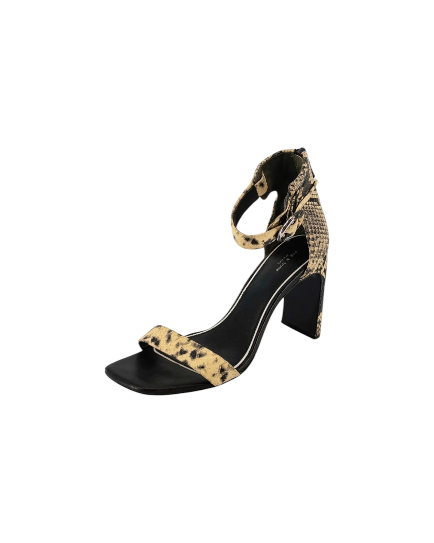 A single women's heeled sandal with a black footbed and a beige and black animal-print strap and ankle strap, shown on a plain white background.