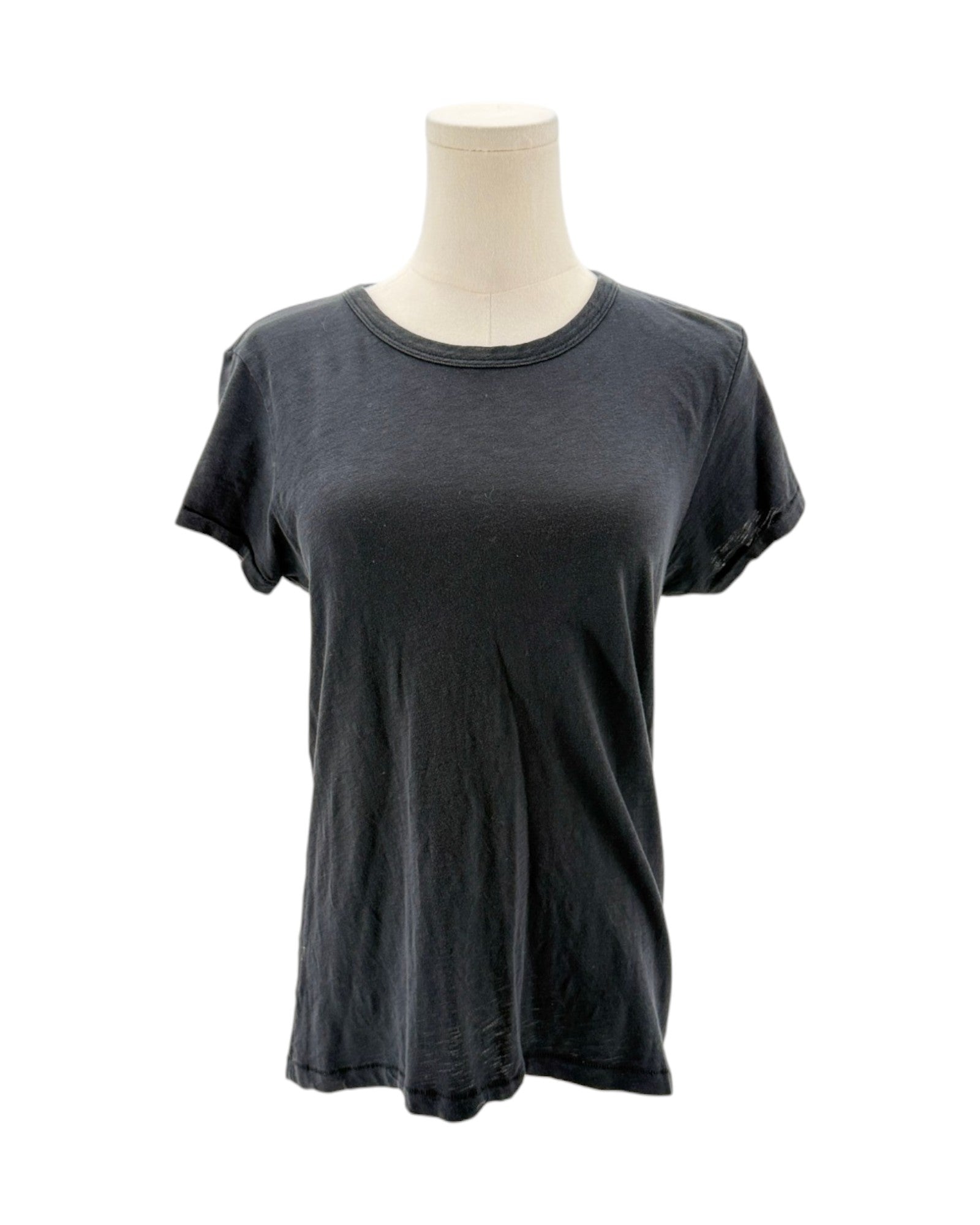 Black t-shirt on a mannequin against a white background