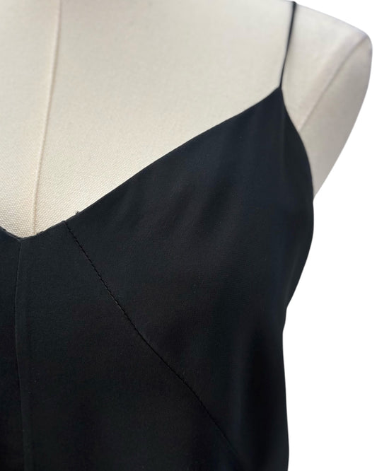 Black camisole top on a mannequin with a white background