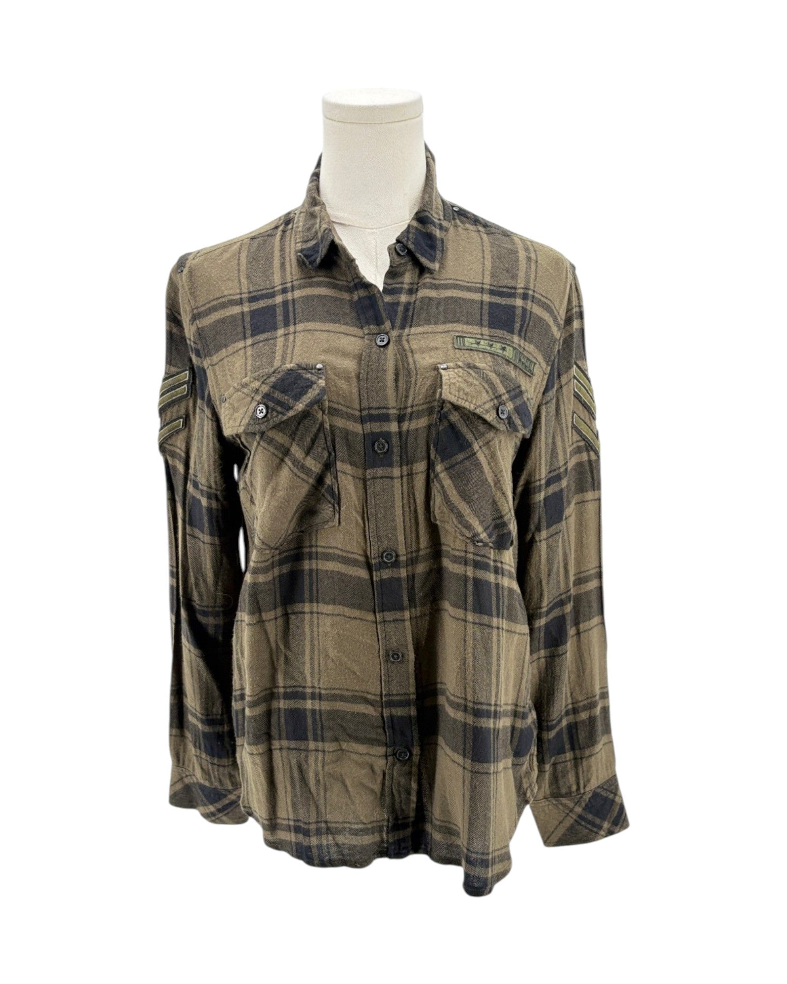 Plaid shirt on a mannequin against a white background
