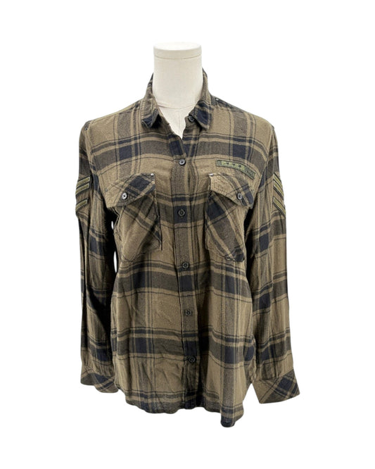 Plaid shirt on a mannequin against a white background