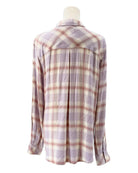 Plaid shirt on a mannequin against a white background