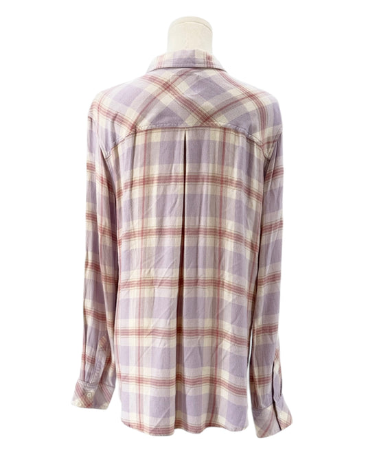 Plaid shirt on a mannequin against a white background