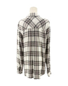 Plaid shirt on a mannequin against a white background