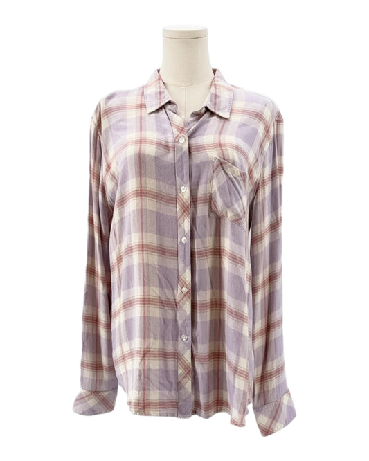 Plaid shirt on a mannequin against a white background