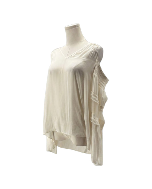 An off-white, asymmetrical draped top displayed on a mannequin torso against a plain white background.