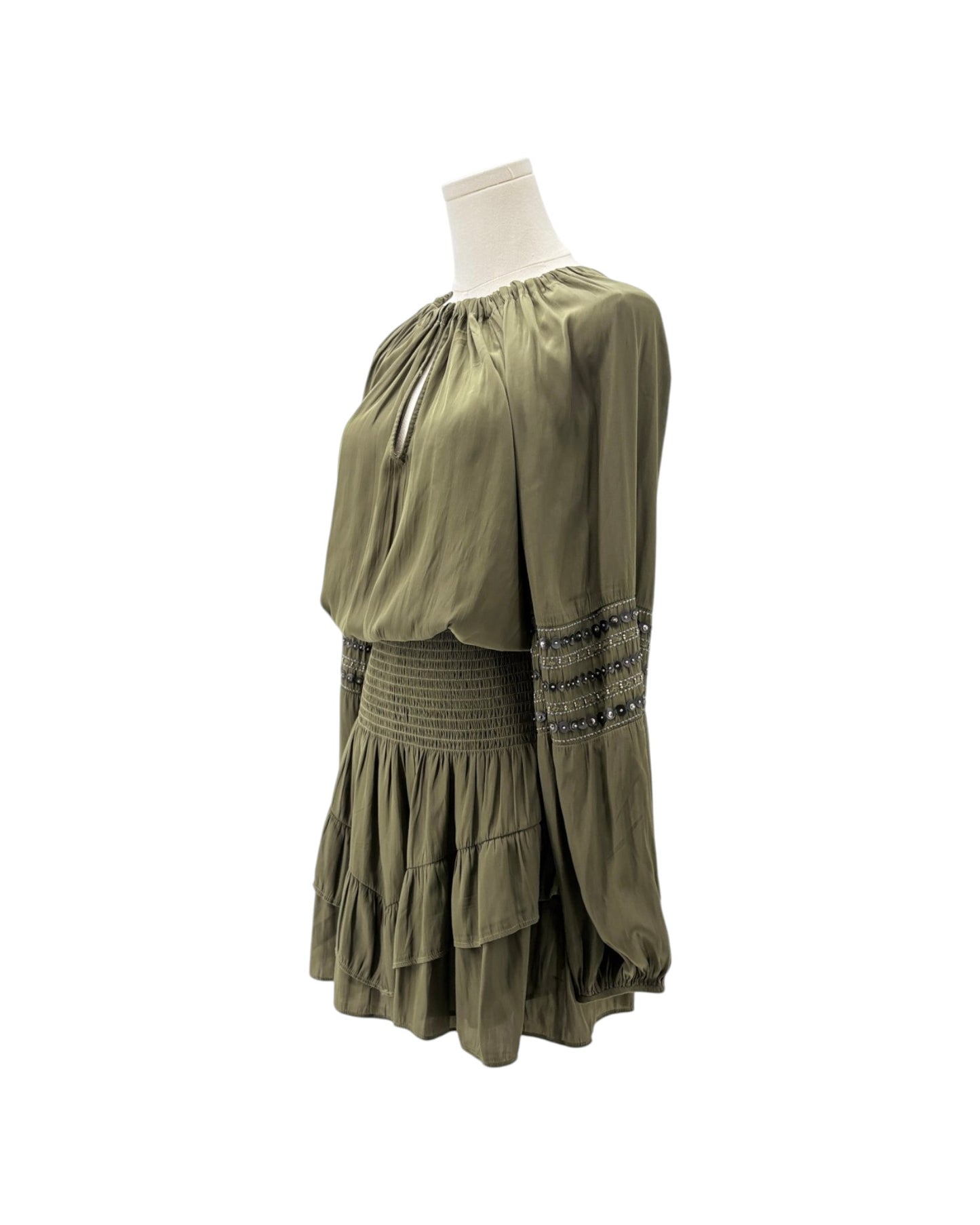 An olive green bohemian-style long-sleeve dress displayed on a white mannequin torso against a plain white background.