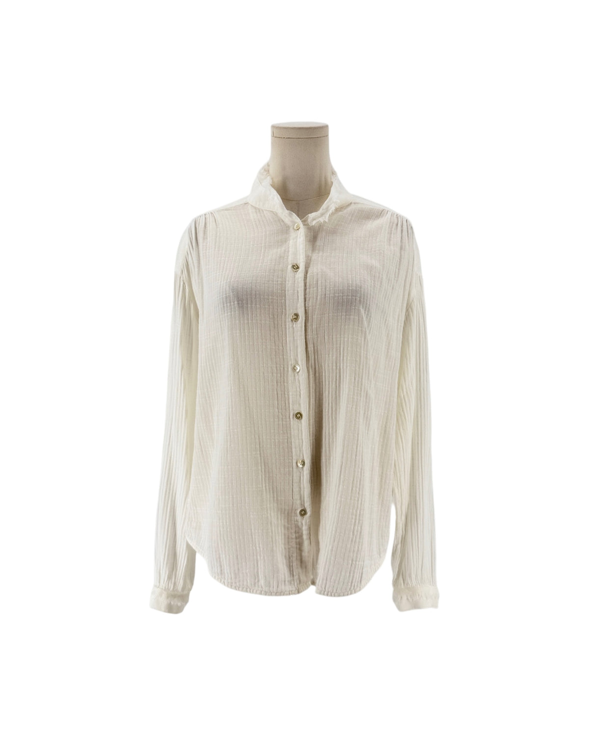 White button down blouse with a raw edge neckline and cuffs, round neckline, long sleeve with button cuff, front button-down closure, transparent fabric on a white background on a mannequin