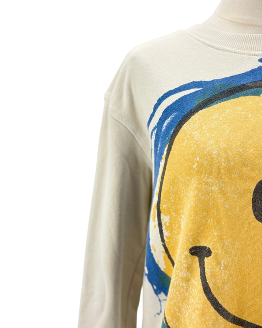 Cream sweatshirt with smiley face design on a mannequin on a white background