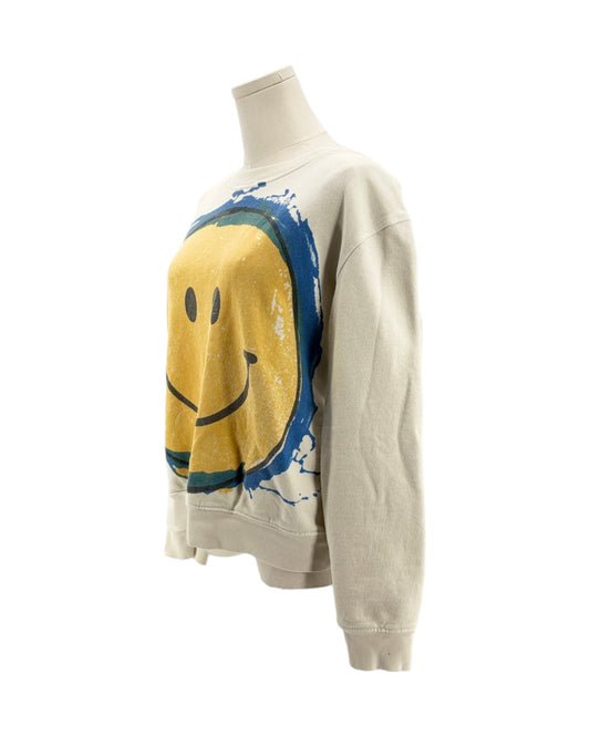 Cream sweatshirt with smiley face design on a mannequin on a white background