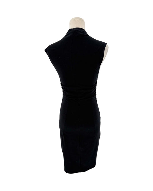 A black sleeveless bodycon dress displayed on a cream-colored dress form mannequin against a plain white background.