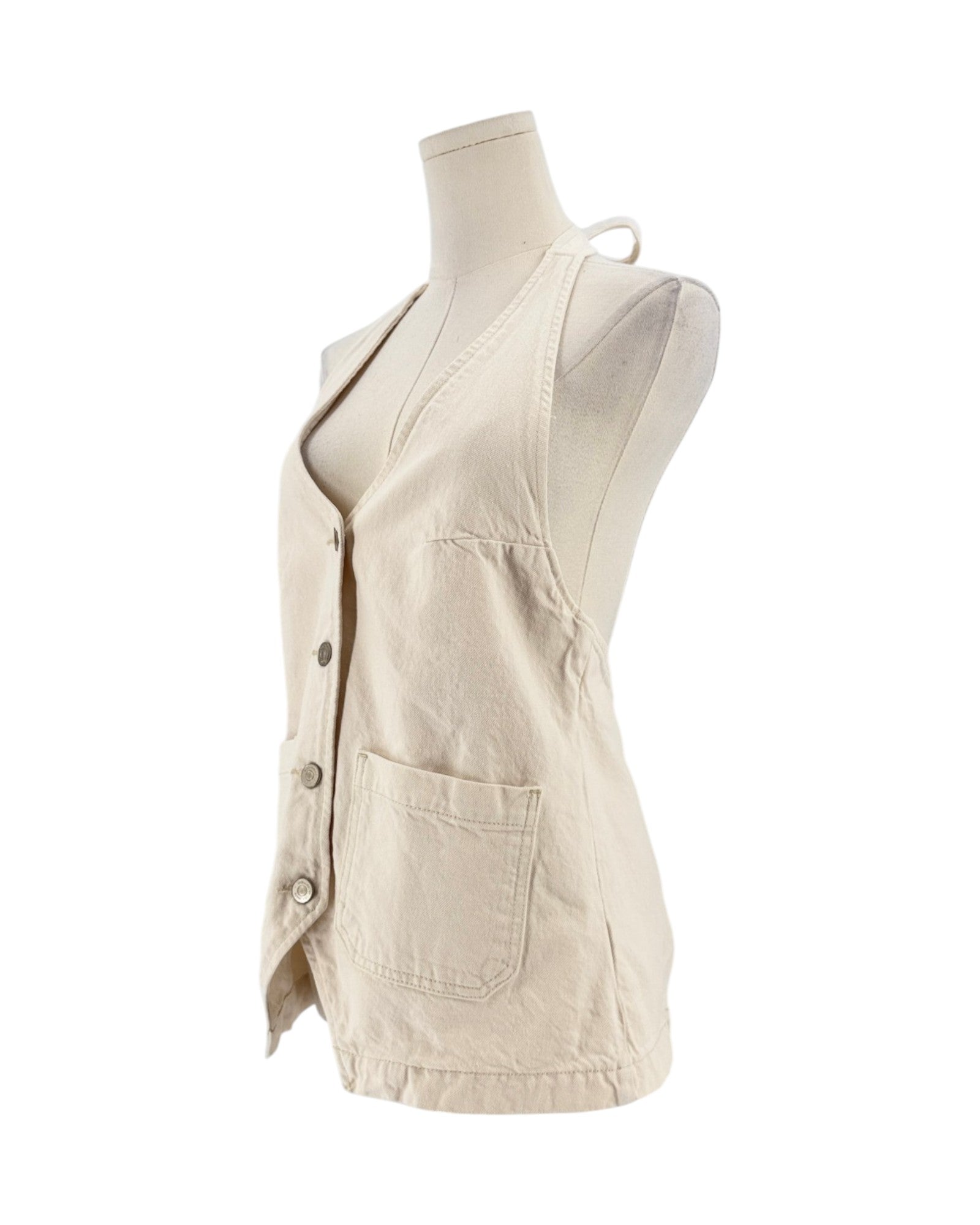 A sleeveless beige vest displayed on a mannequin torso against a plain white background.