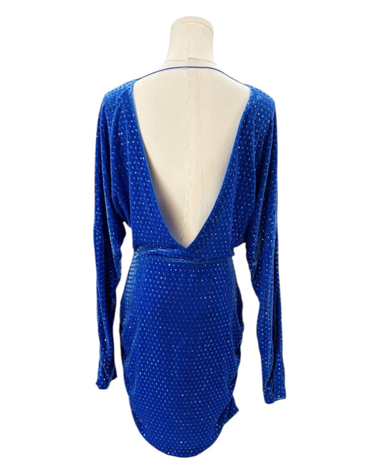 Blue dress with a plunging neckline on a mannequin against a white background