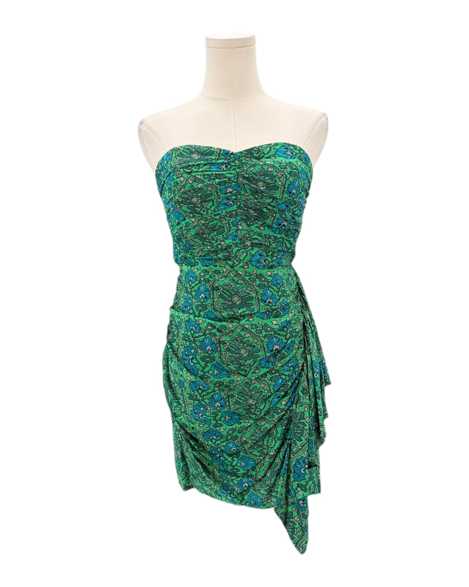 Blue green pattered mini dress on mannequin