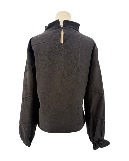 Rohe black long-sleeve shirt on a mannequin against a white background