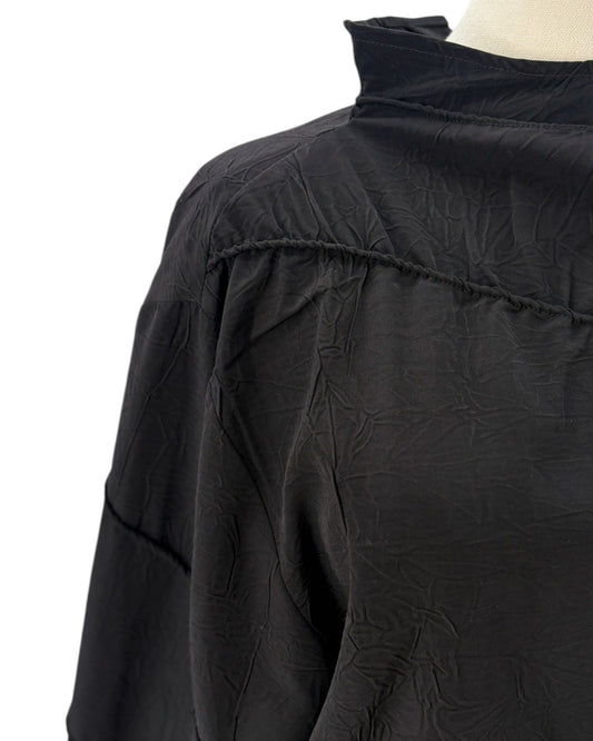 Rohe black long-sleeve shirt on a mannequin against a white background