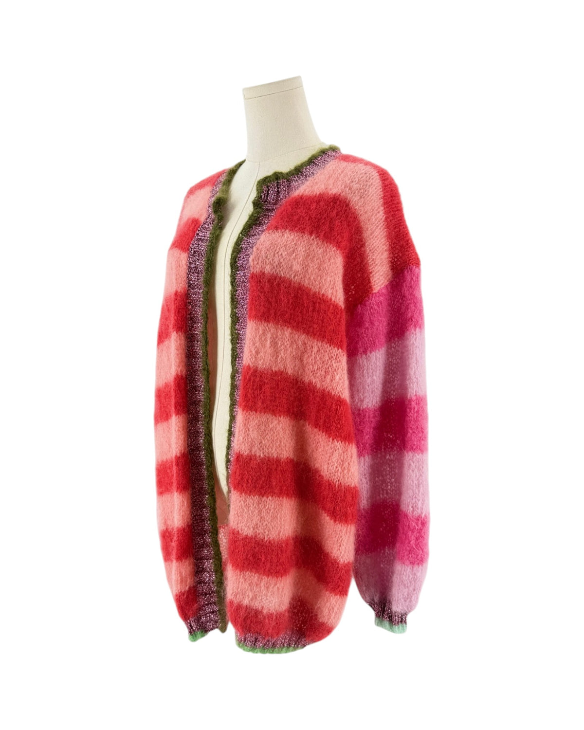 A fuzzy knit sweater with horizontal wavy stripes in shades of red, pink, and coral, displayed on a mannequin from the back against a plain white background.