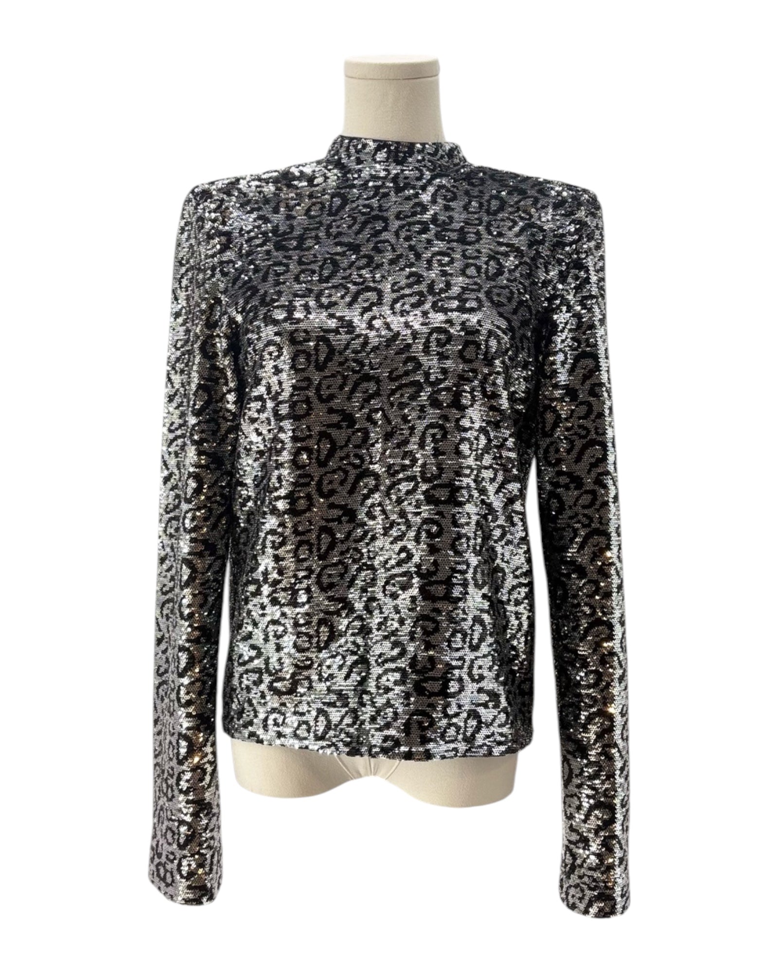 Leopard print long-sleeve top on a mannequin against a white background