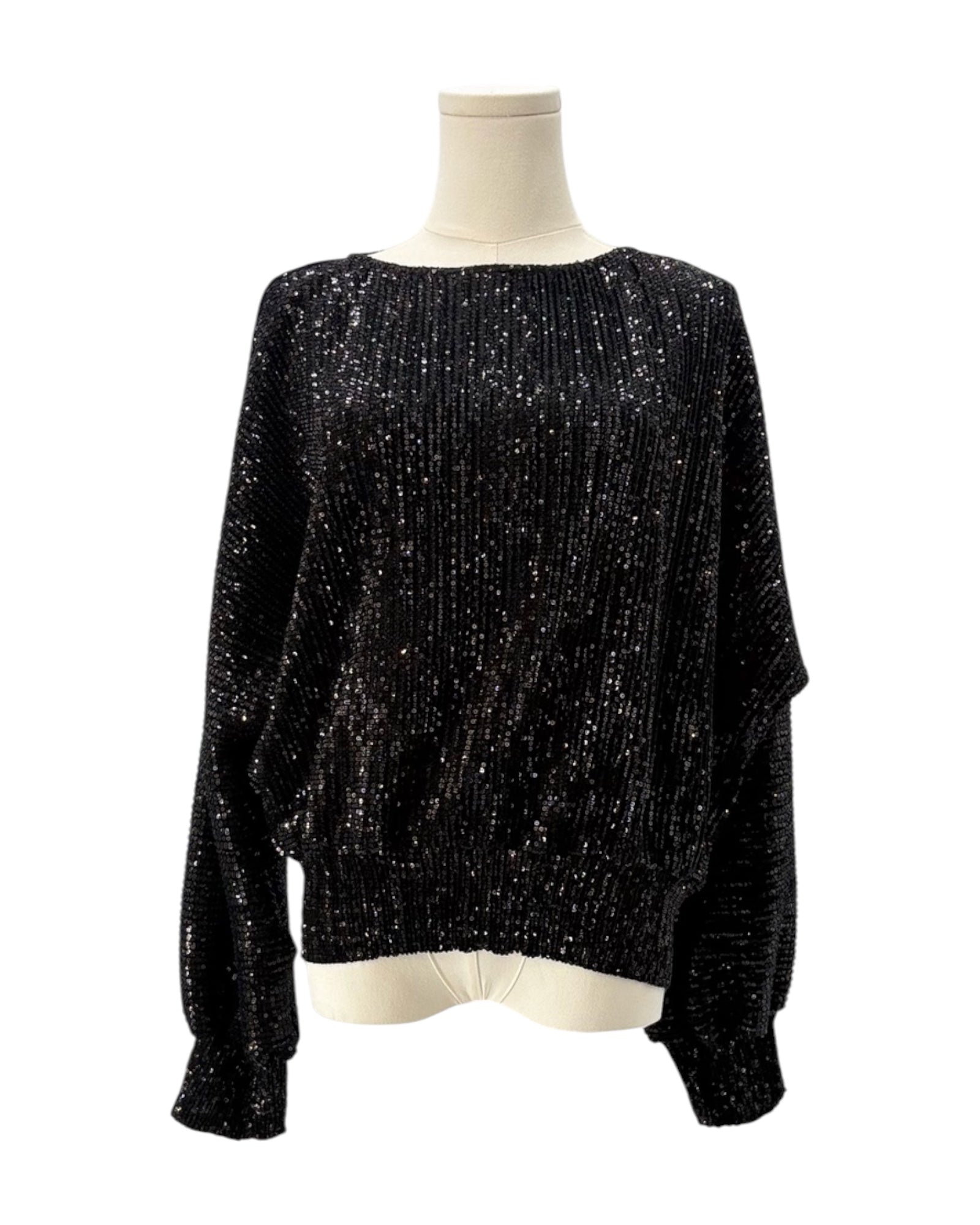 Black sequin blouse on a mannequin against a white background