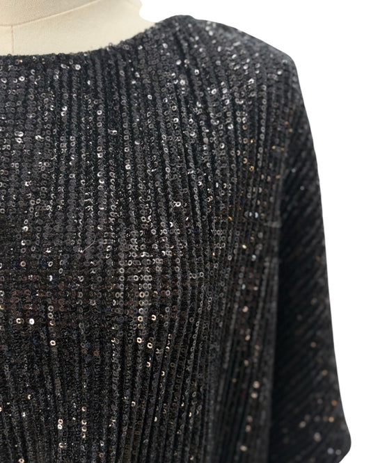 Black sequin on mannequin on white background