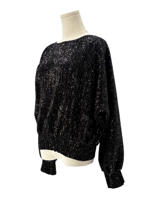 Black sequin blouse on a mannequin against a white background