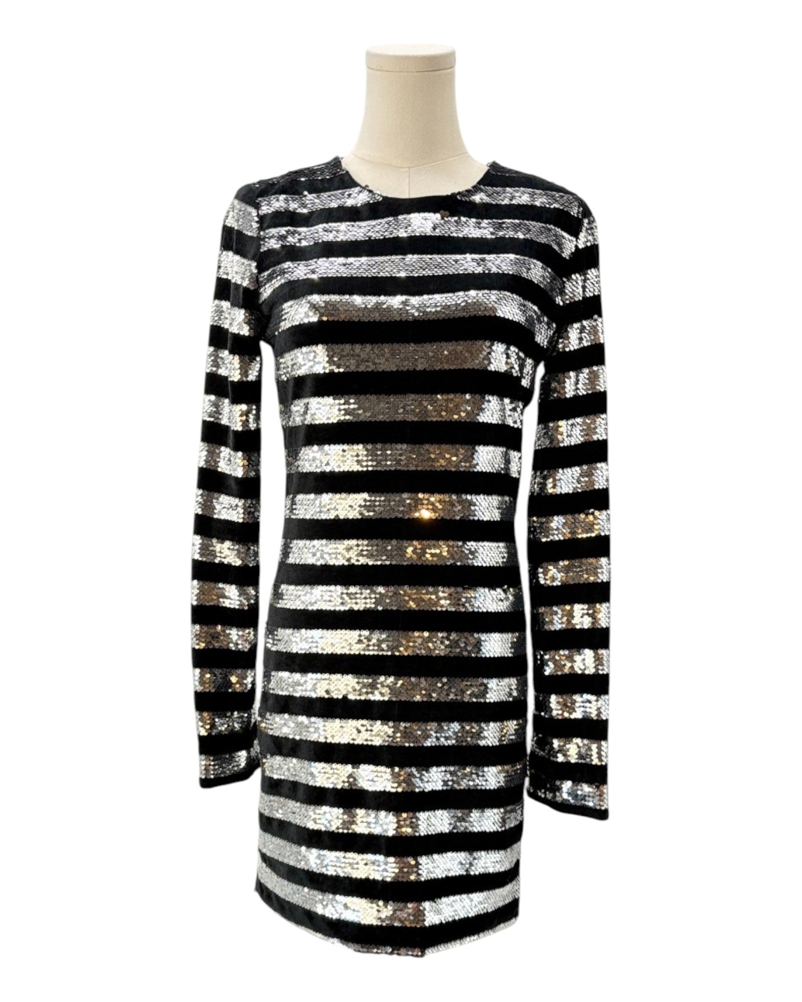 Black and silver striped dress on a mannequin against a white background