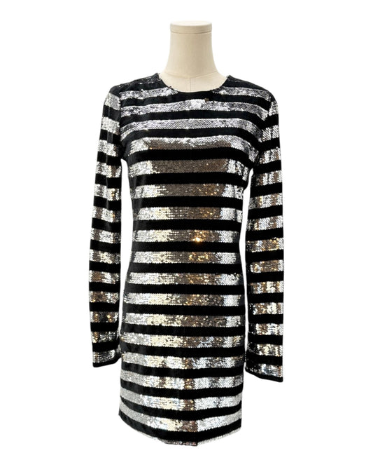 Black and silver striped dress on a mannequin against a white background