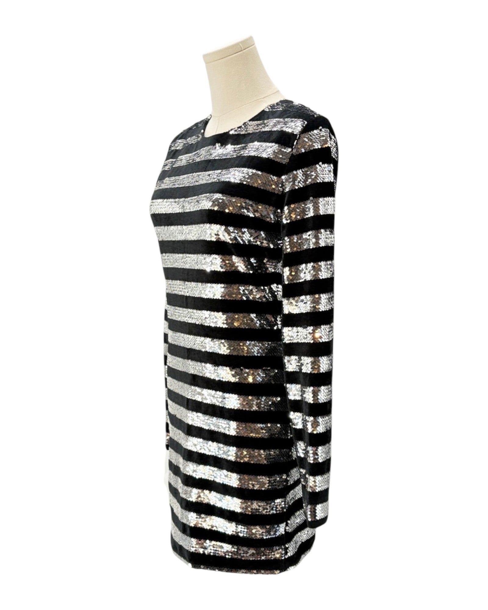 Black and silver striped dress on a mannequin against a white background