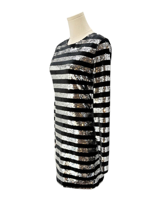Black and silver striped dress on a mannequin against a white background