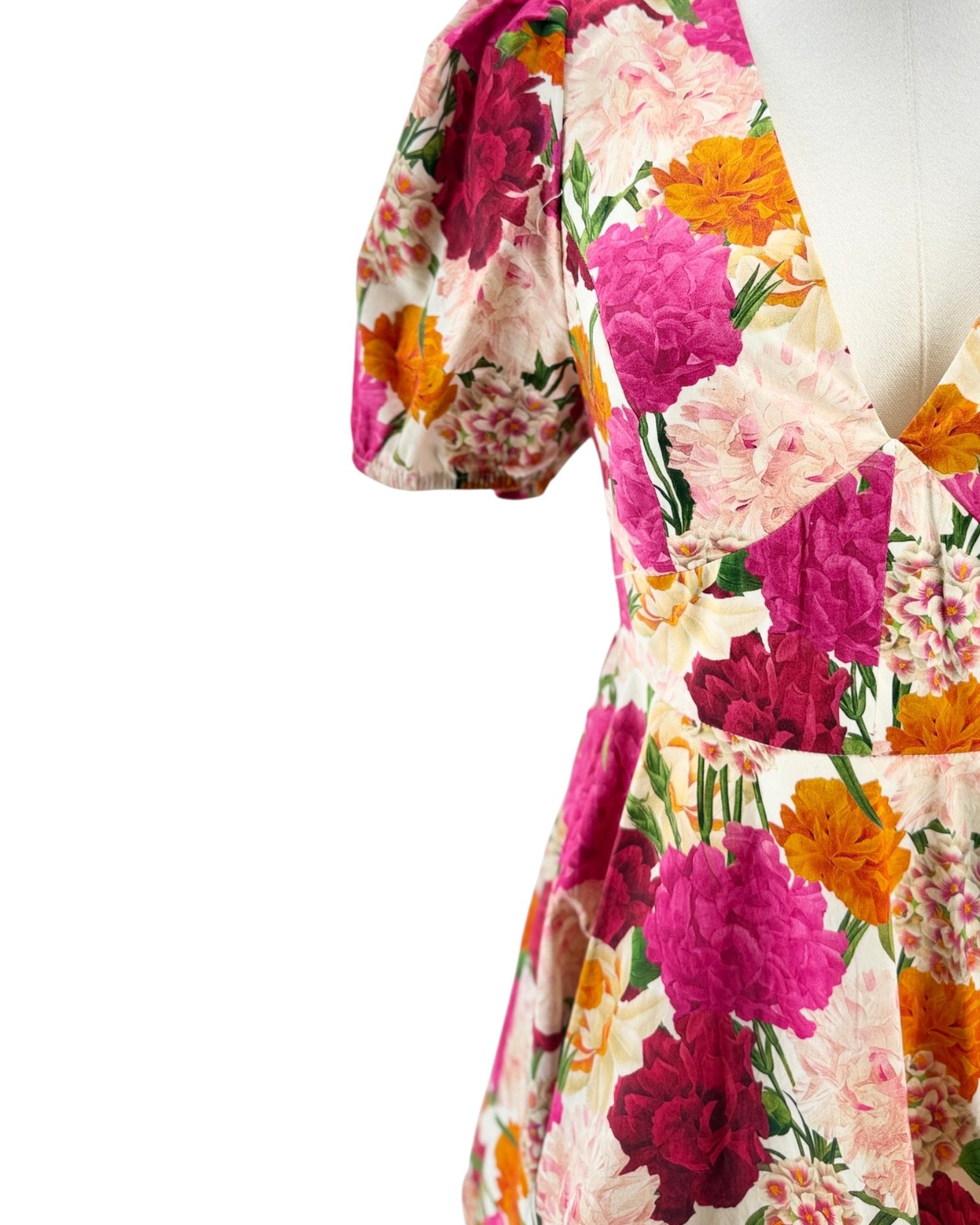 Floral dress with vibrant colors on a white background