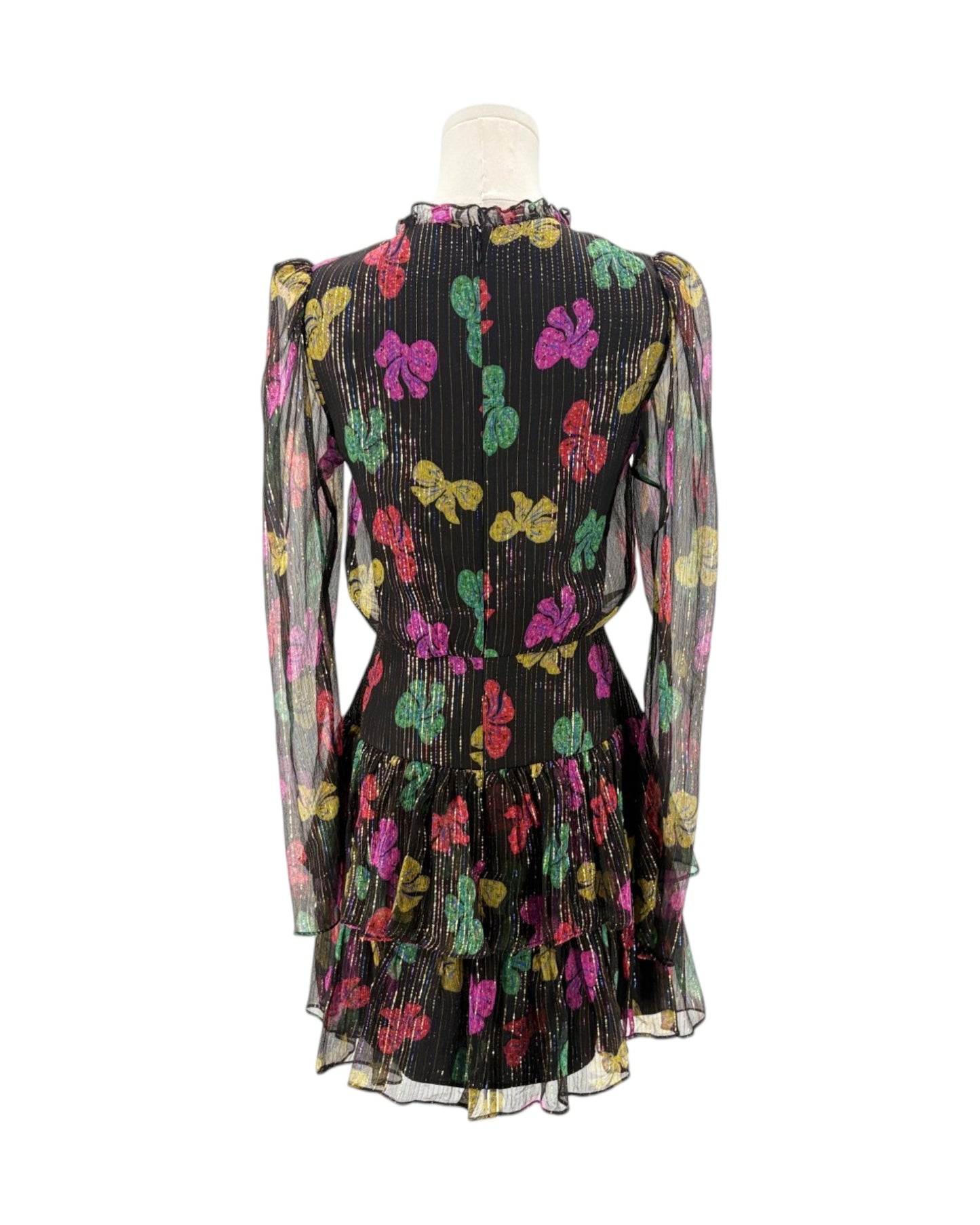 Mannequin wearing a black dress with colorful floral patterns on a white background