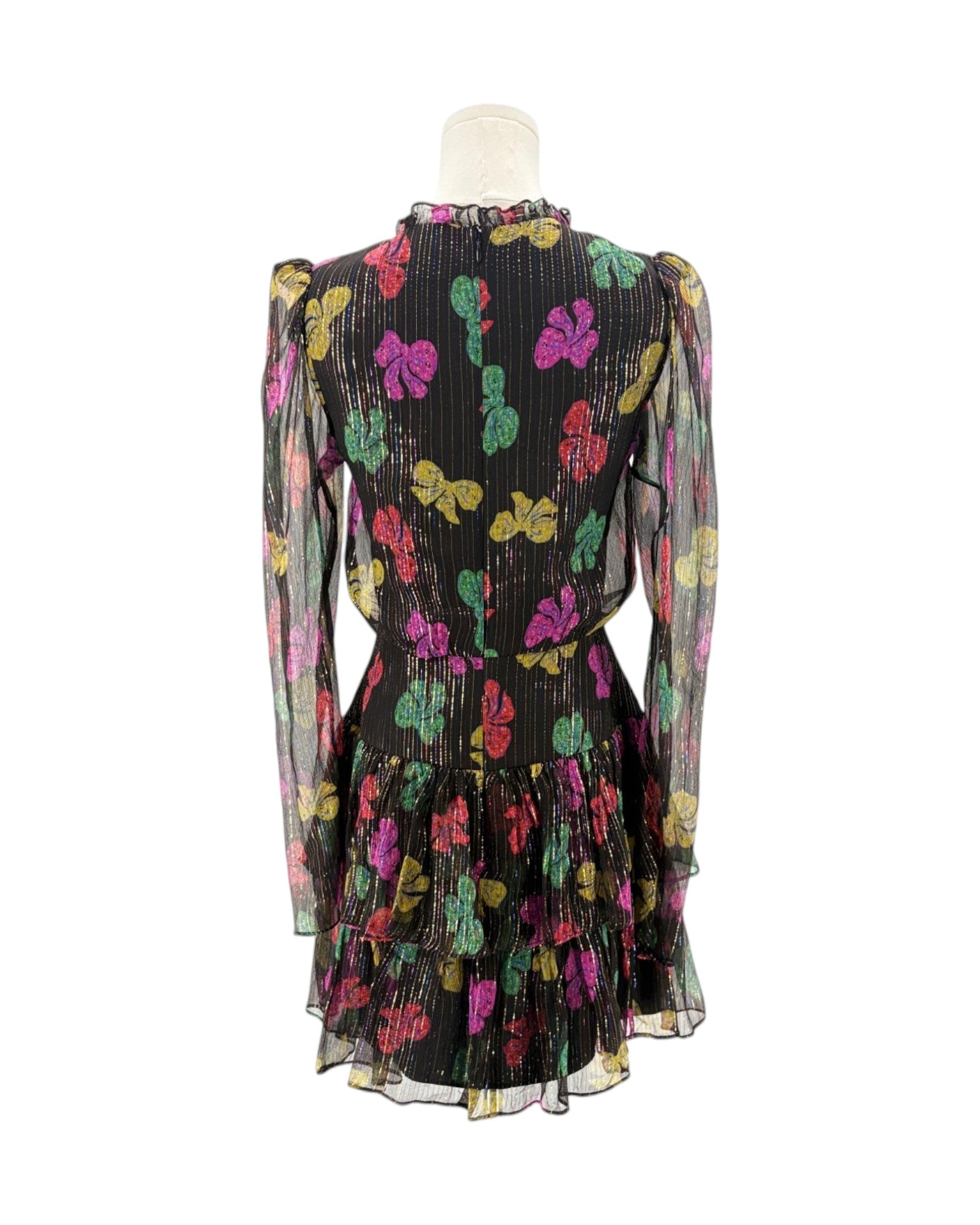 Mannequin wearing a black dress with colorful floral patterns on a white background