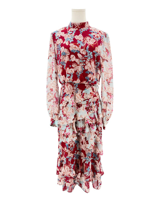 Floral dress on a mannequin against a white background