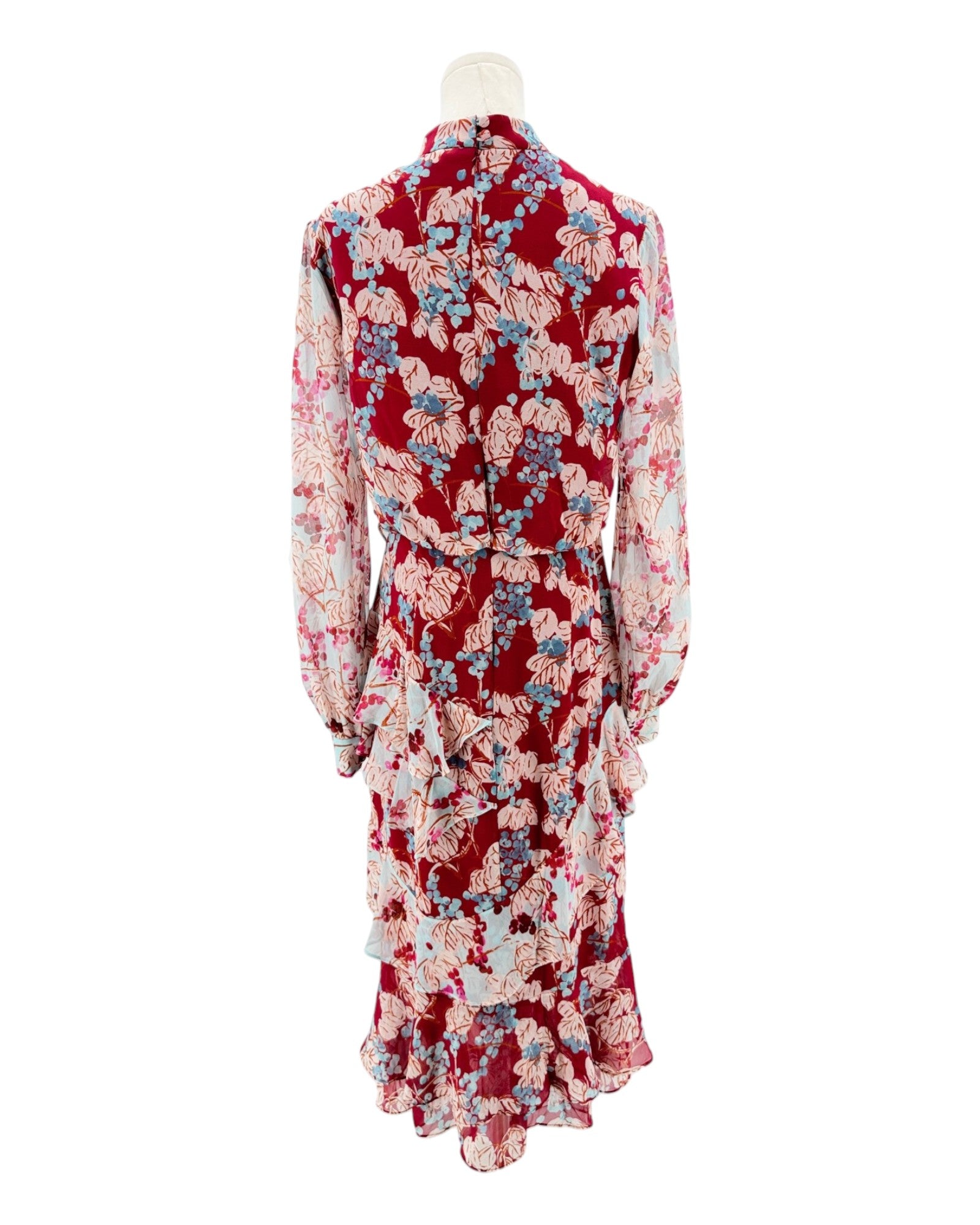 Red floral dress on a mannequin against a white background