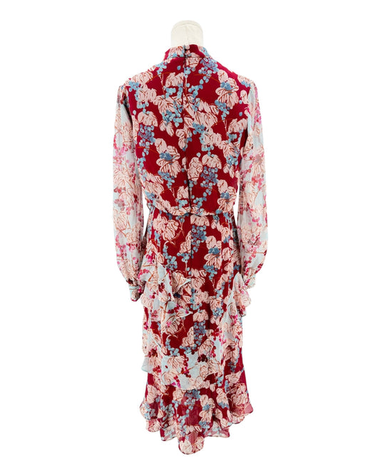 Red floral dress on a mannequin against a white background