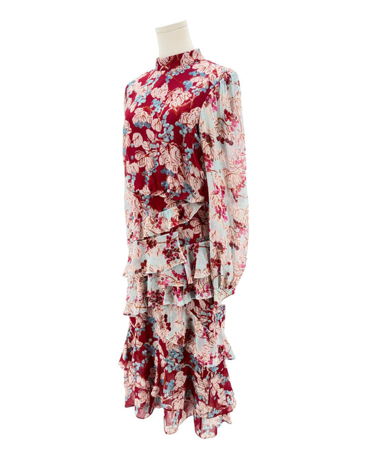Floral dress on a mannequin against a white background