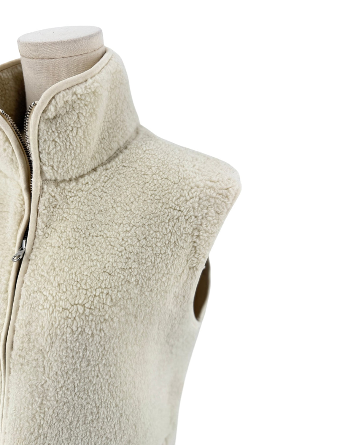 Beige vest on a white background