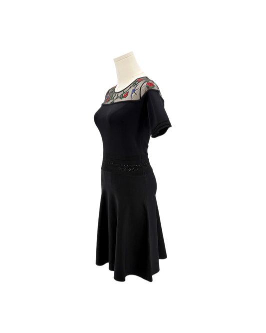 black mini dress on a white background