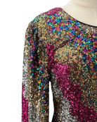 Multicolored sequin dress on a mannequin with a white background