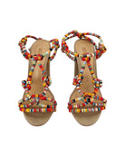 Colorful braided sandals on a white background