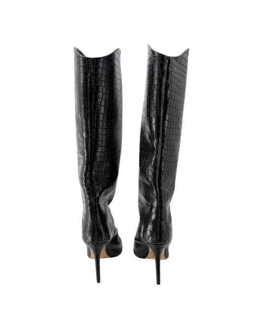 A pair of black crocodile-embossed leather knee-high boots with pointed stiletto heels, shown from the back against a plain white background.