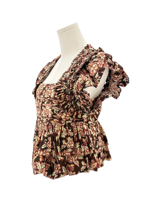 Floral patterned dress on a mannequin against a white background