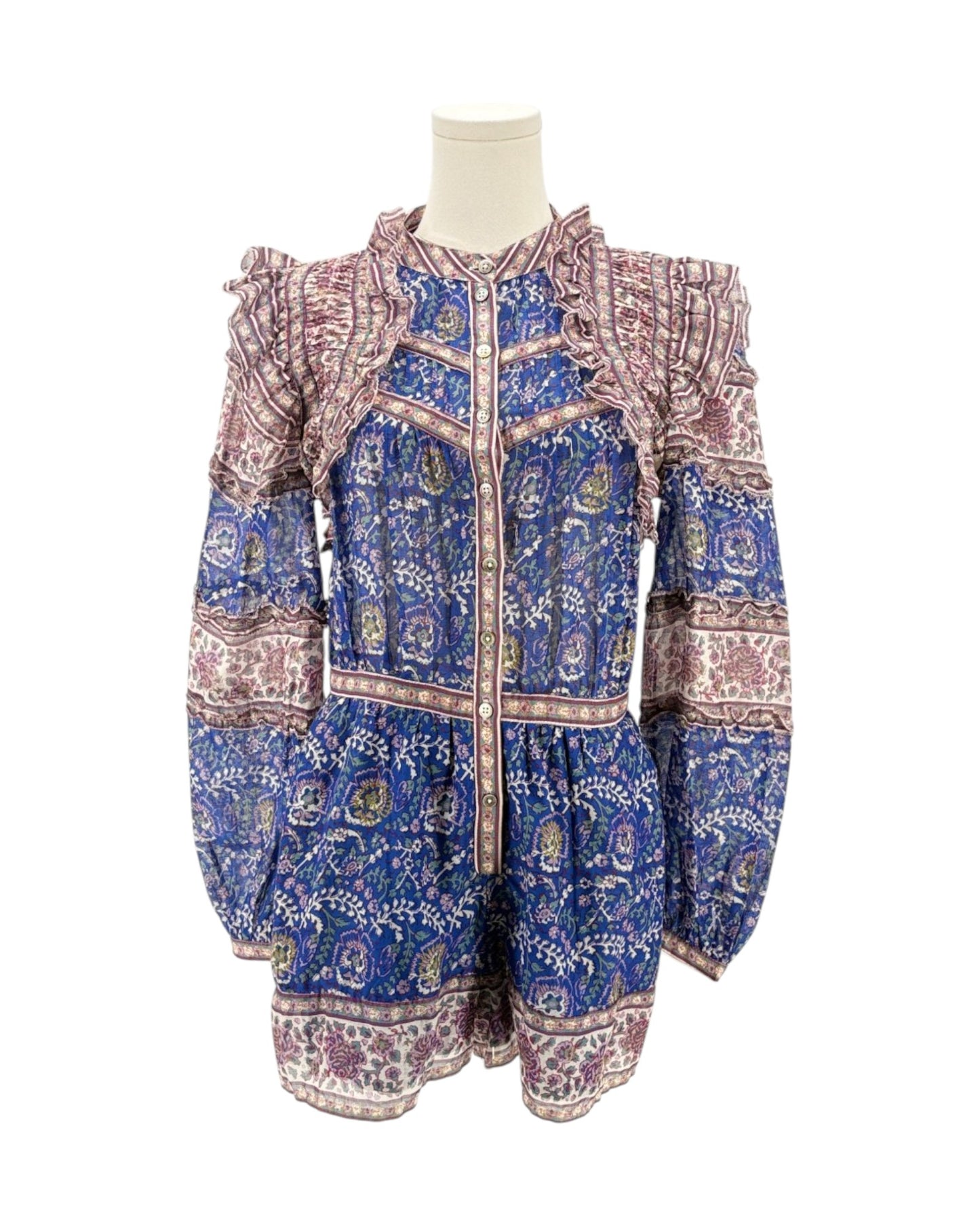 Mannequin wearing a blue and pink patterned jacket on a white background