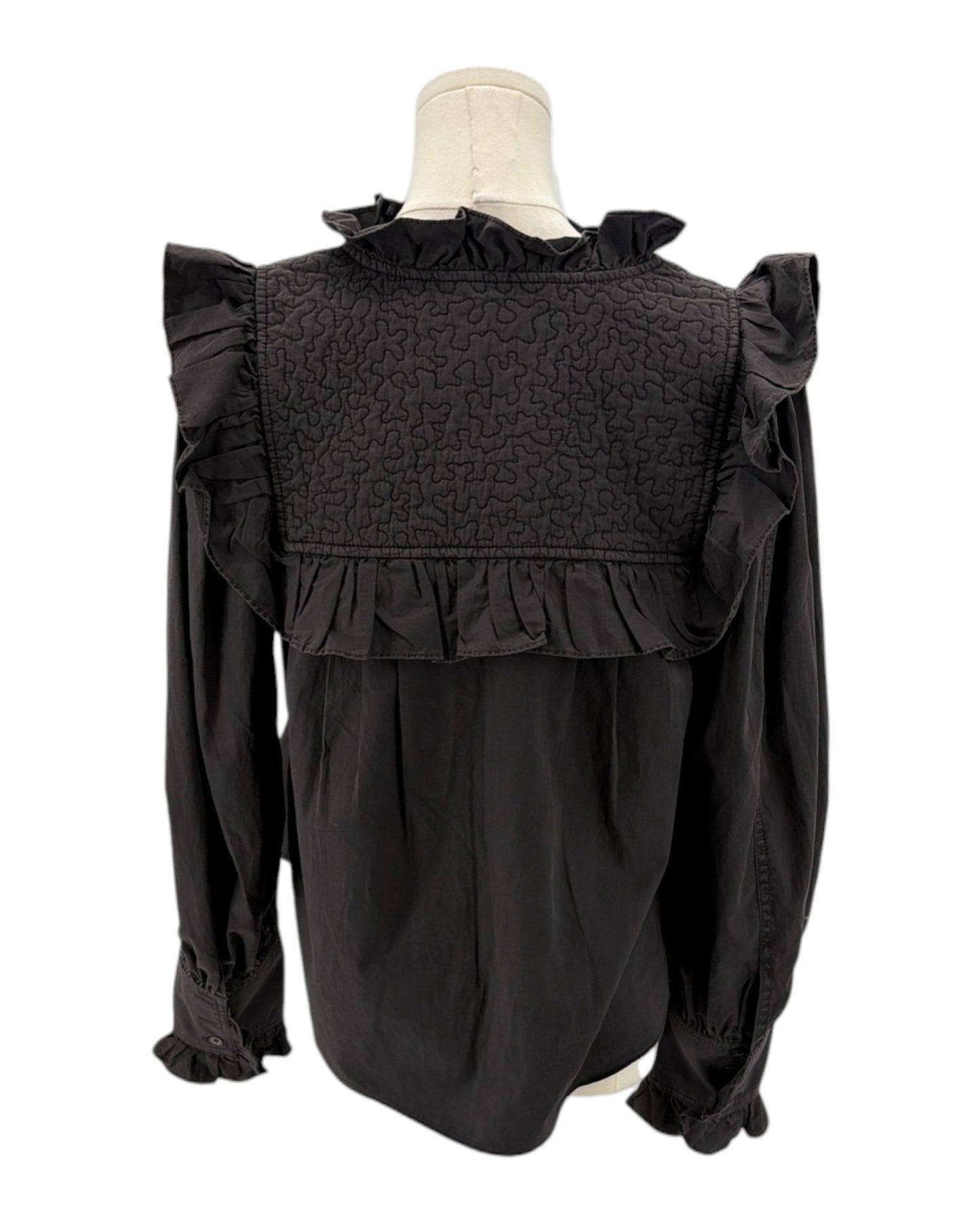 Dark gray blouse with ruffled details on a mannequin against a white background