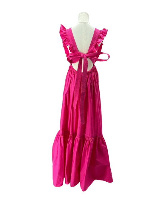 Pink dress on a mannequin against a white background