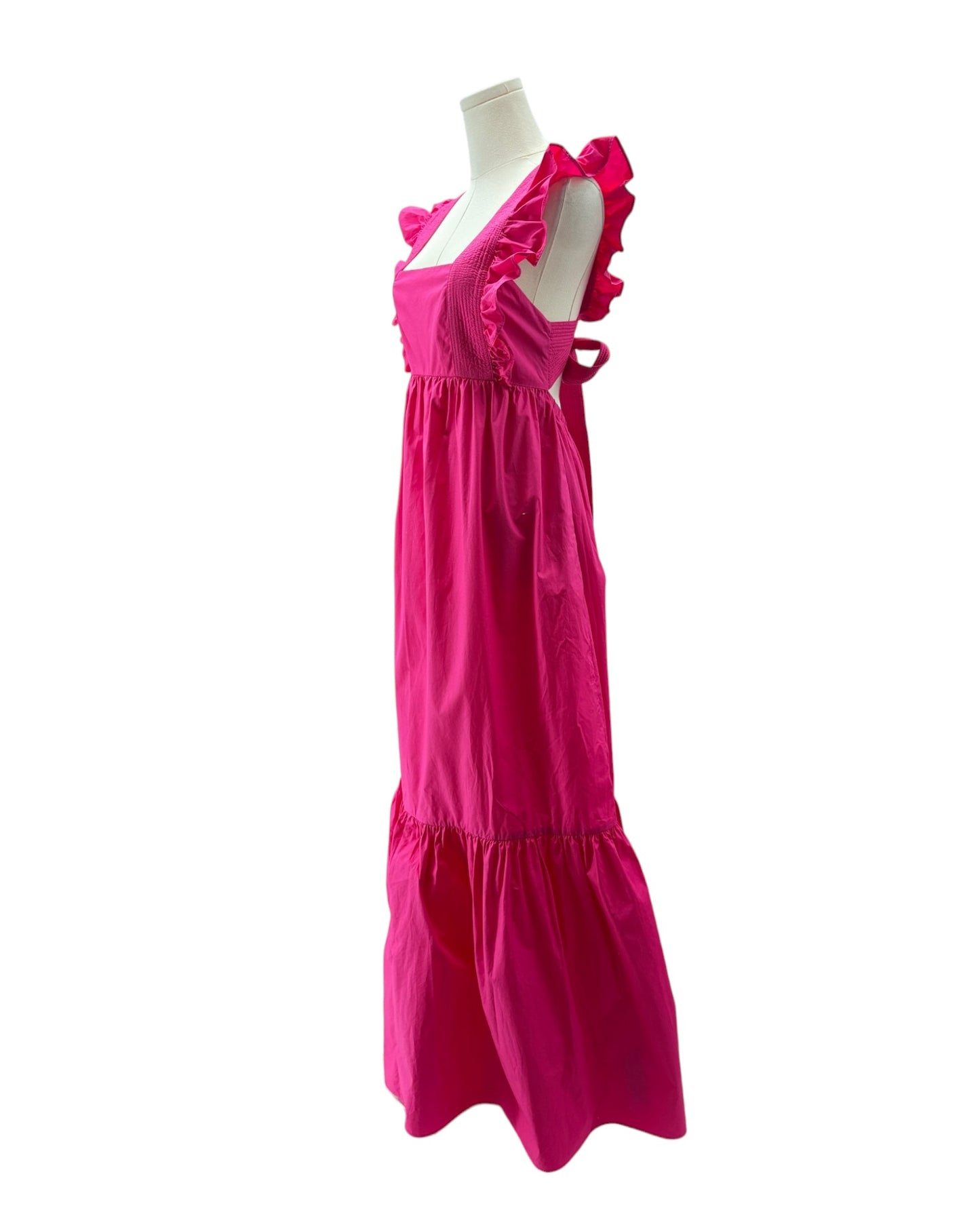 Pink dress on a mannequin against a white background